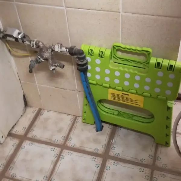 Faulty stopcock on the incoming water main before replacement