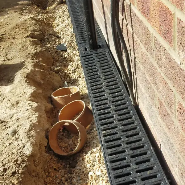 ACO channel drain installation with new clay drain fittings